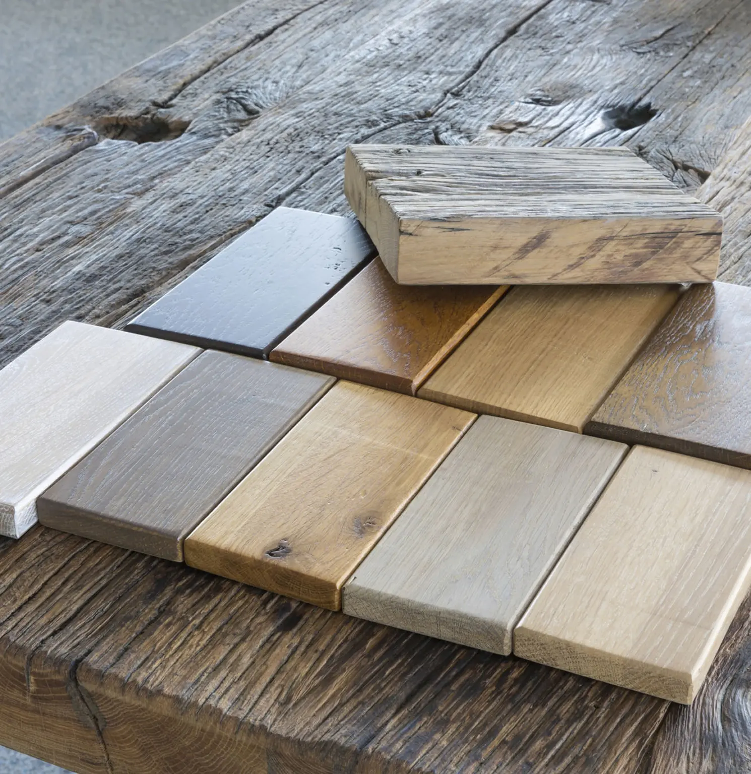 Wood samples on rustic wooden table.